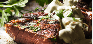 Rib eye steak with blue cheese sauce